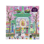Front 500 piece jigsaw puzzle with Easter candy shop illustration and open box