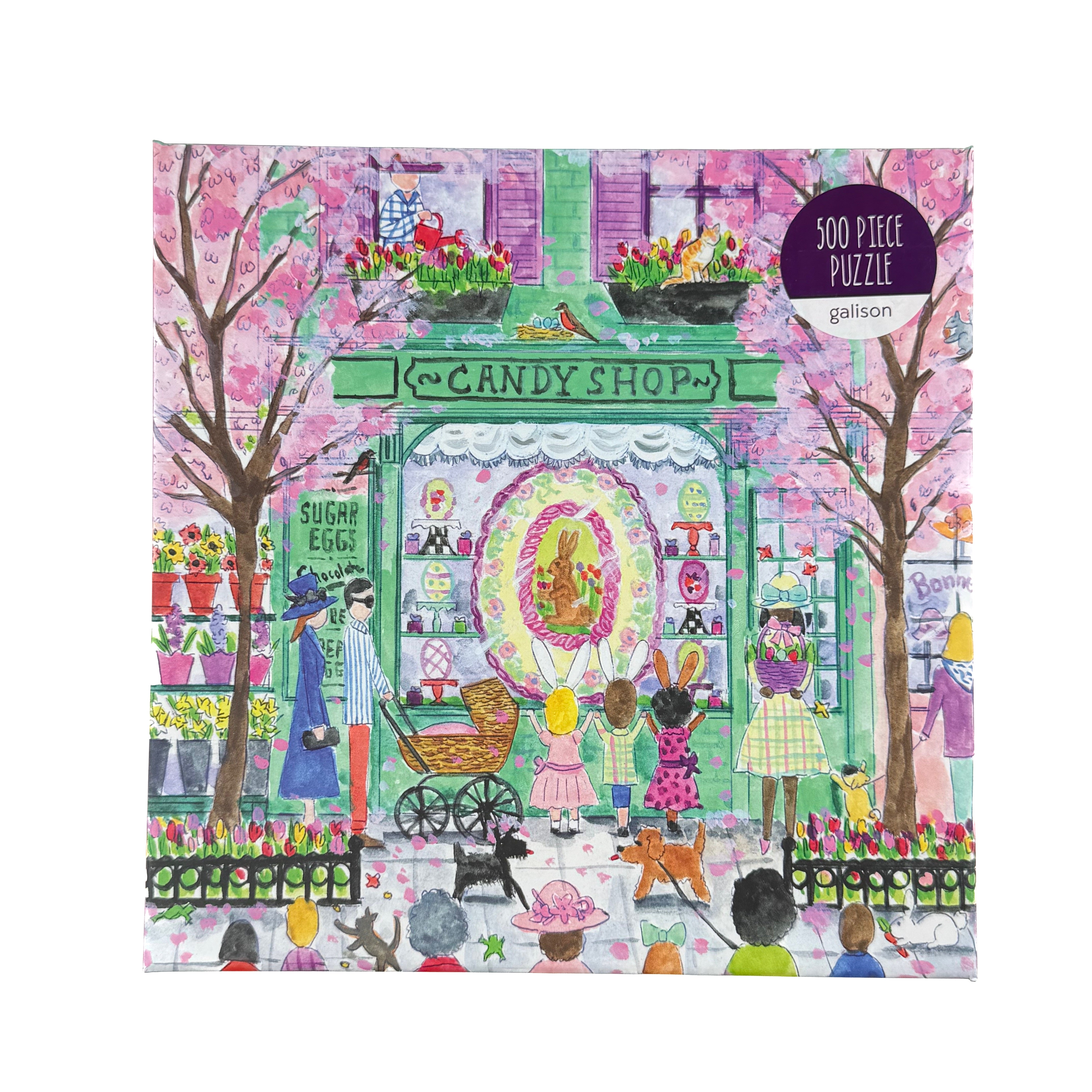 Front 500 piece jigsaw puzzle with Easter candy shop illustration and open box