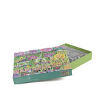 1000 piece jigsaw puzzle with Easter egg hunt park scene and open box