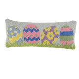 front rectangular hooked pillow with colorful Easter eggs and grass design
