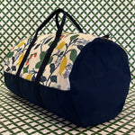 End view of the Strawberry Hill duffle bag in navy blue