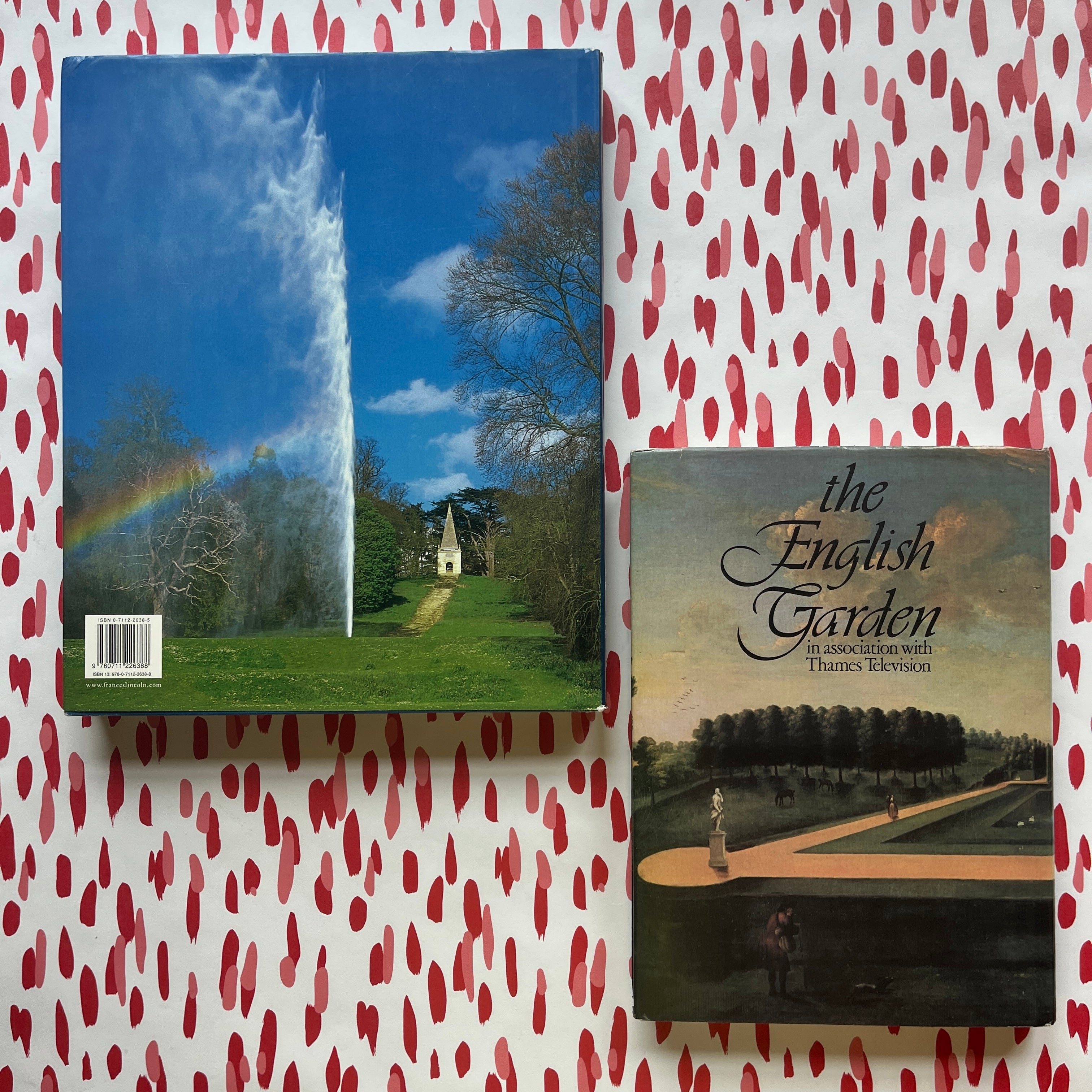 Back of Two English garden coffee table books displayed on patterned background, featuring classic landscape photography and historic garden imagery 