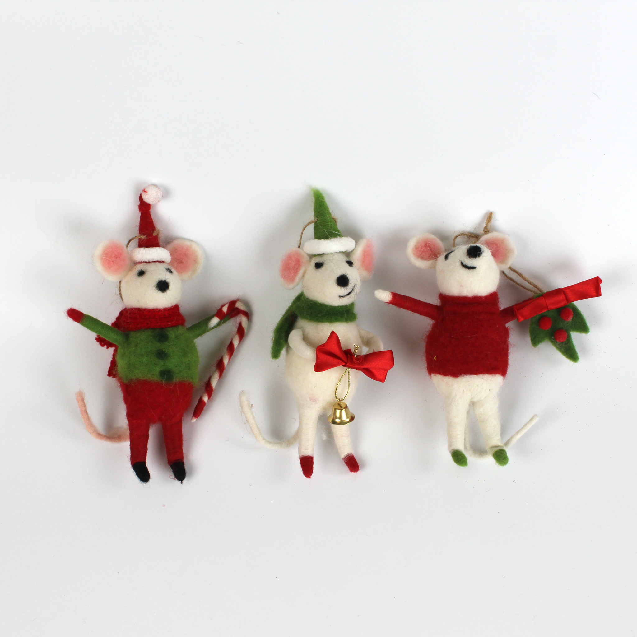 Three festive felt mouse ornaments dressed in holiday outfits with a white background