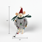 A 4.5-inch tall and 3-inch wide felt mouse ornament wearing a red Santa hat, green scarf, and fuzzy gray outfit, wrapped in colorful holiday string lights.
