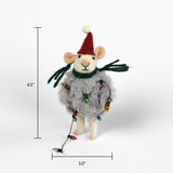 A 4.5-inch tall and 3-inch wide felt mouse ornament wearing a red Santa hat, green scarf, and fuzzy gray outfit, wrapped in colorful holiday string lights.
