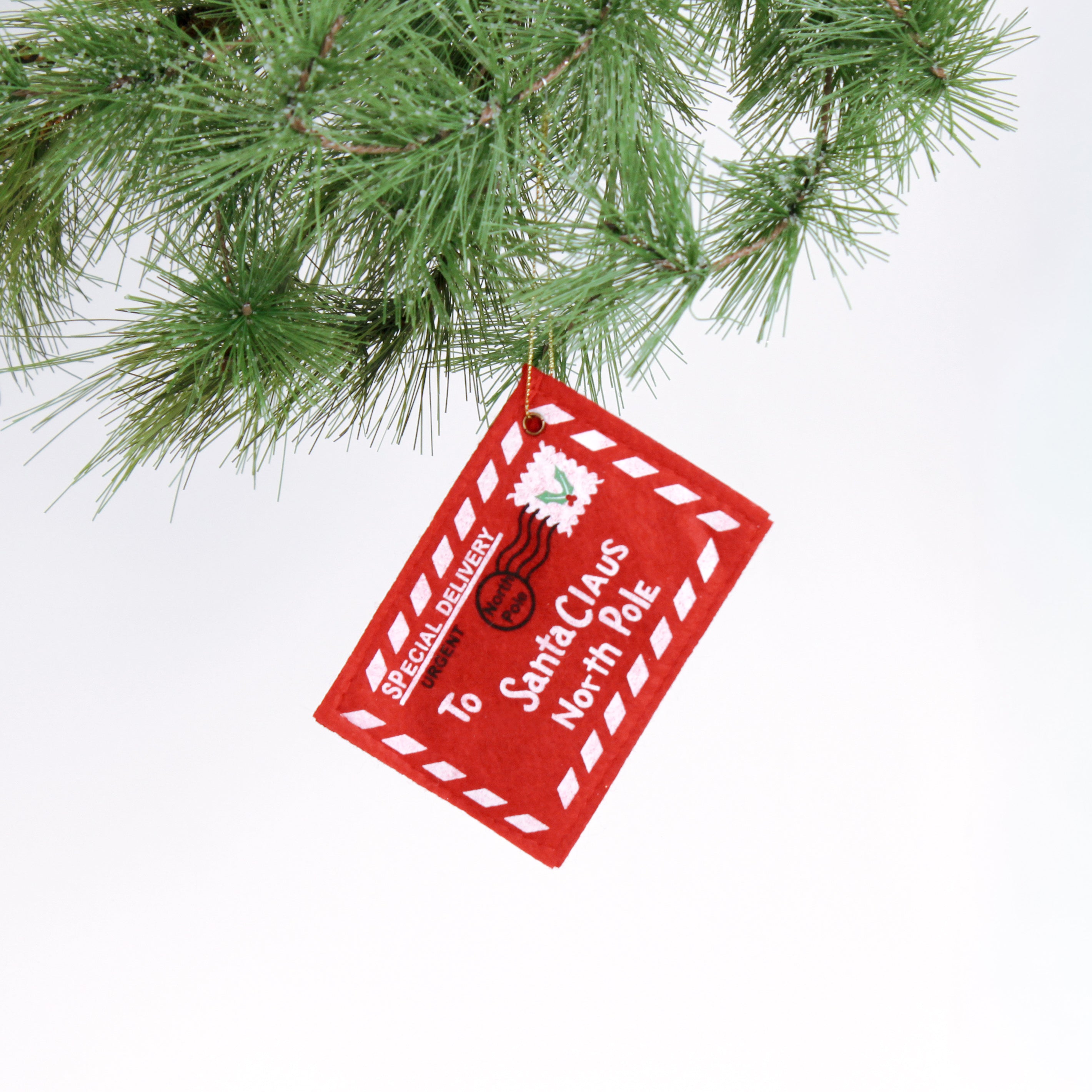 Felt letter to santa christmas ornament on a white background