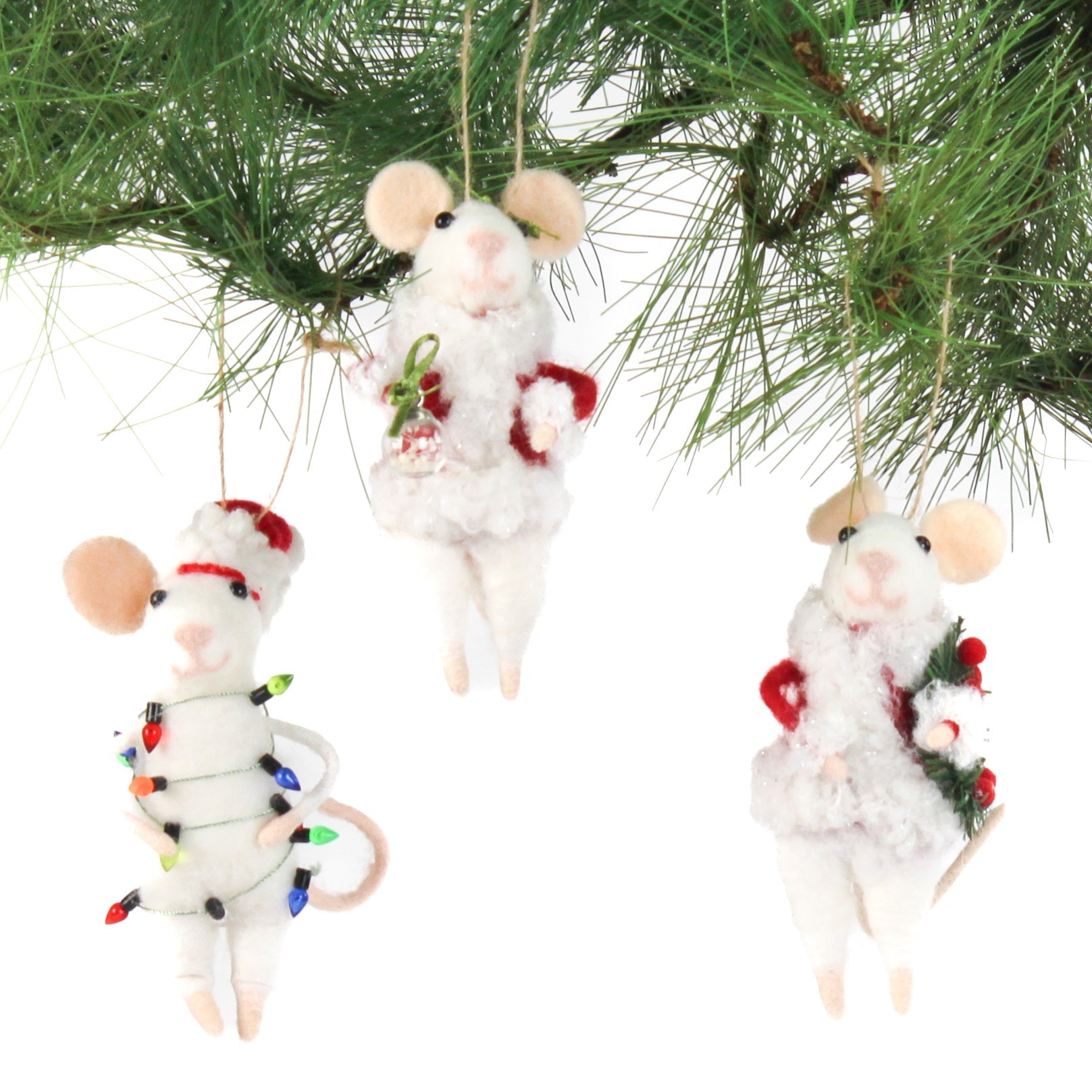 Three white felt mouse ornaments dressed in cozy winter outfits, one wrapped in colorful holiday lights, one holding a Christmas wreath, and one holding a festive ornament
