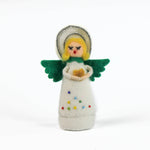 angel christmas table decoration made from felt with colorful clothing and green wings on a white background