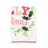 A Madcap Cottage Christmas tea towel with holly motifs and text that reads Have a Holly Jolly Christmas