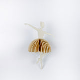 Decorative ballerina christmas ornament with beige skirt on a white background
