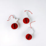back of Set of three folding paper Santa Christmas ornaments in vibrant red with honeycomb-style bases