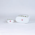 Garden Follies caddy with green topiary illustration, shown in two sizes