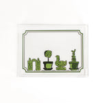 Garden Follies is a rectangular acrylic tray with a white base and green topiary motifs on the bottom border. 