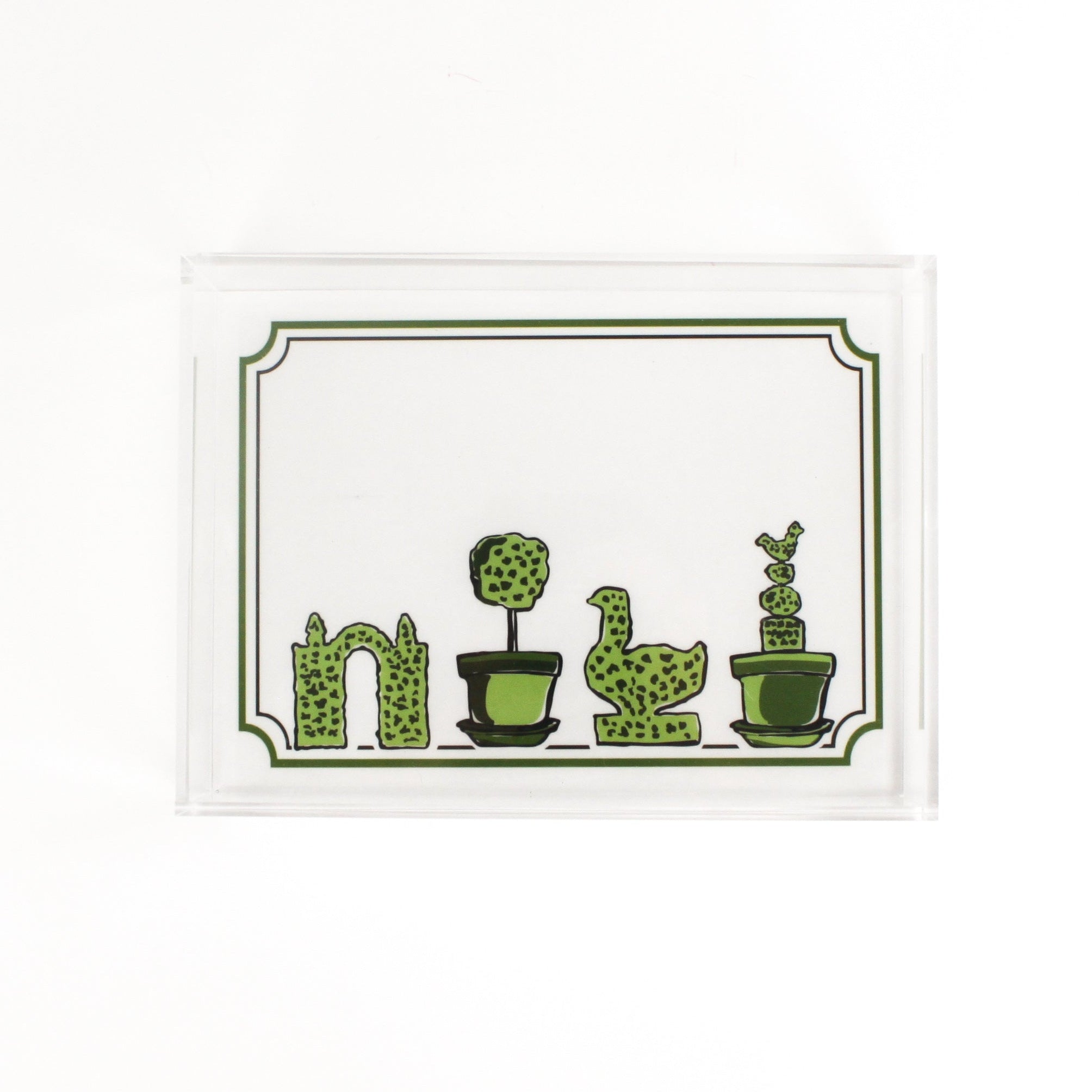 Garden Follies is a rectangular acrylic tray with a white base and green topiary motifs on the bottom border. 