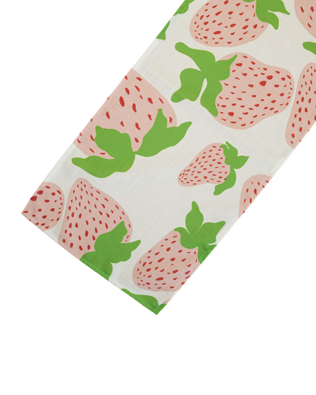 Garden Party Strawberry cloth table runner designed by madcap cottage with motifs of large pink and green strawberries with green stems.