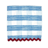 Gin Lane blue gingham cloth napkin with red ric rac trim and textured woven pattern.