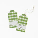 A green gingham patterned gift tags with a white space for personalized message 