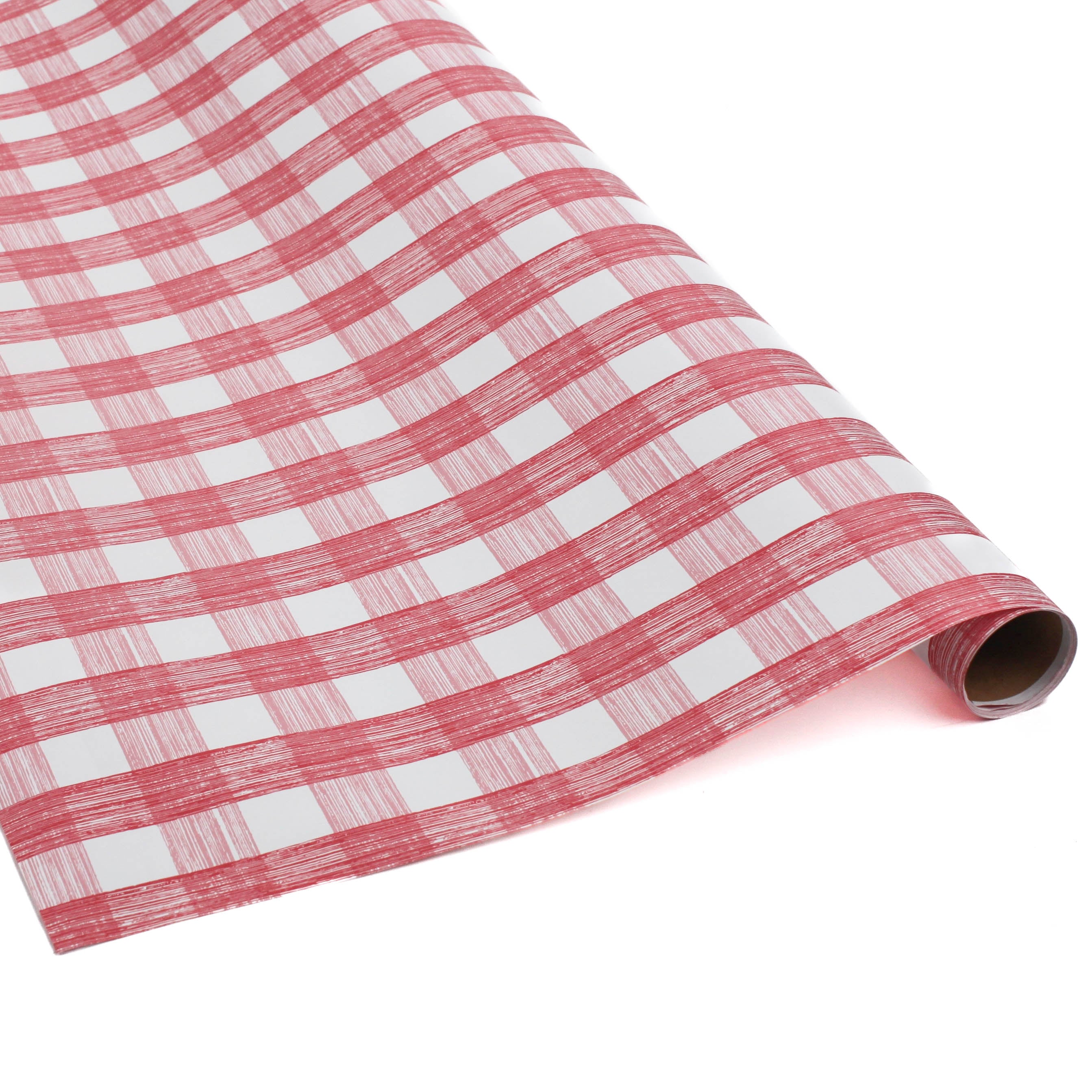 A roll of pink gingham wrapping paper 