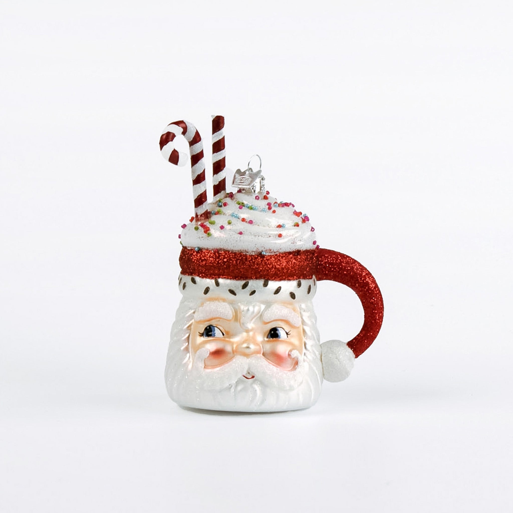 Glass Santa Mug with Glitter Candy Cane Christmas Ornament featuring Santa’s face as a festive mug topped with whipped cream, candy canes, and colorful sprinkles.