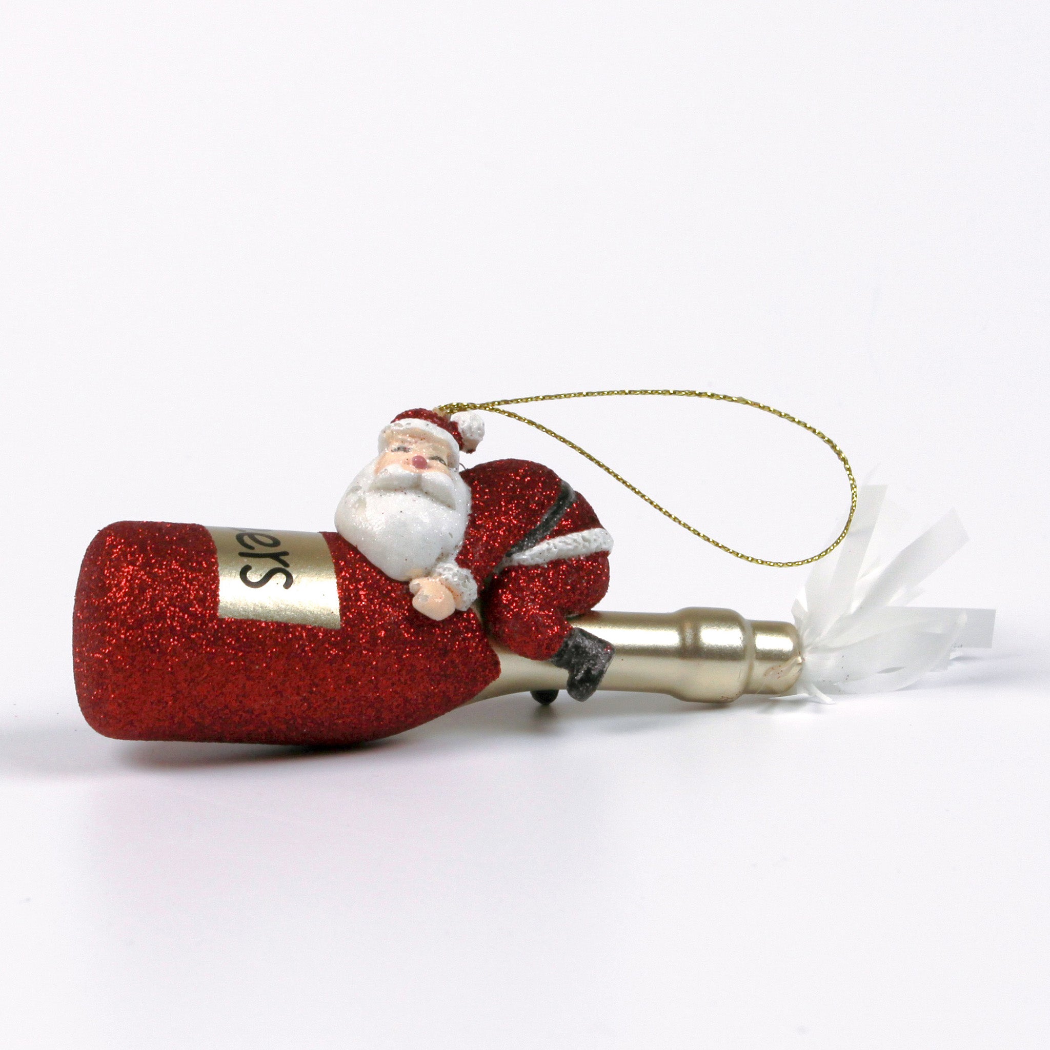a santa riding a red champagne bottle ornament against a white background
