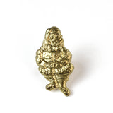 a gold santa Christmas napkin ring on a white background