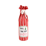 red and white striped wine bag with a “Santa, I have been goodish” label on the front