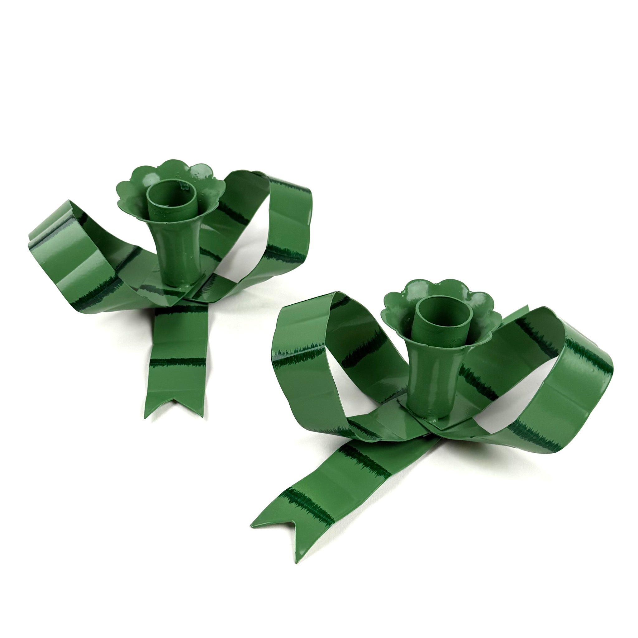 pair of green bow-shaped candleholders