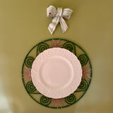 green and white ceramic bow with plate and spring charger