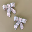 green and white striped ceramic bow decor