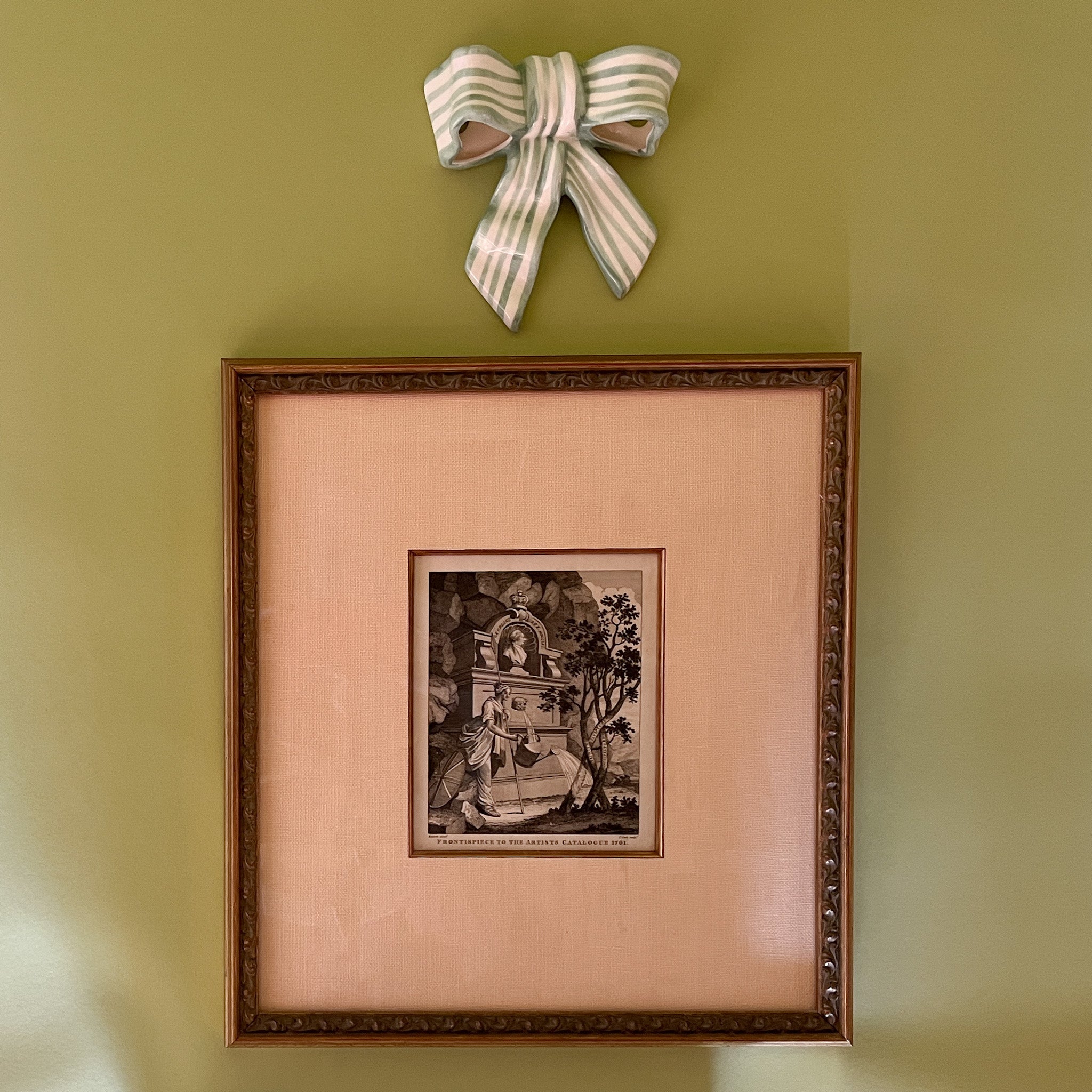 green and white striped ceramic bow wall decor