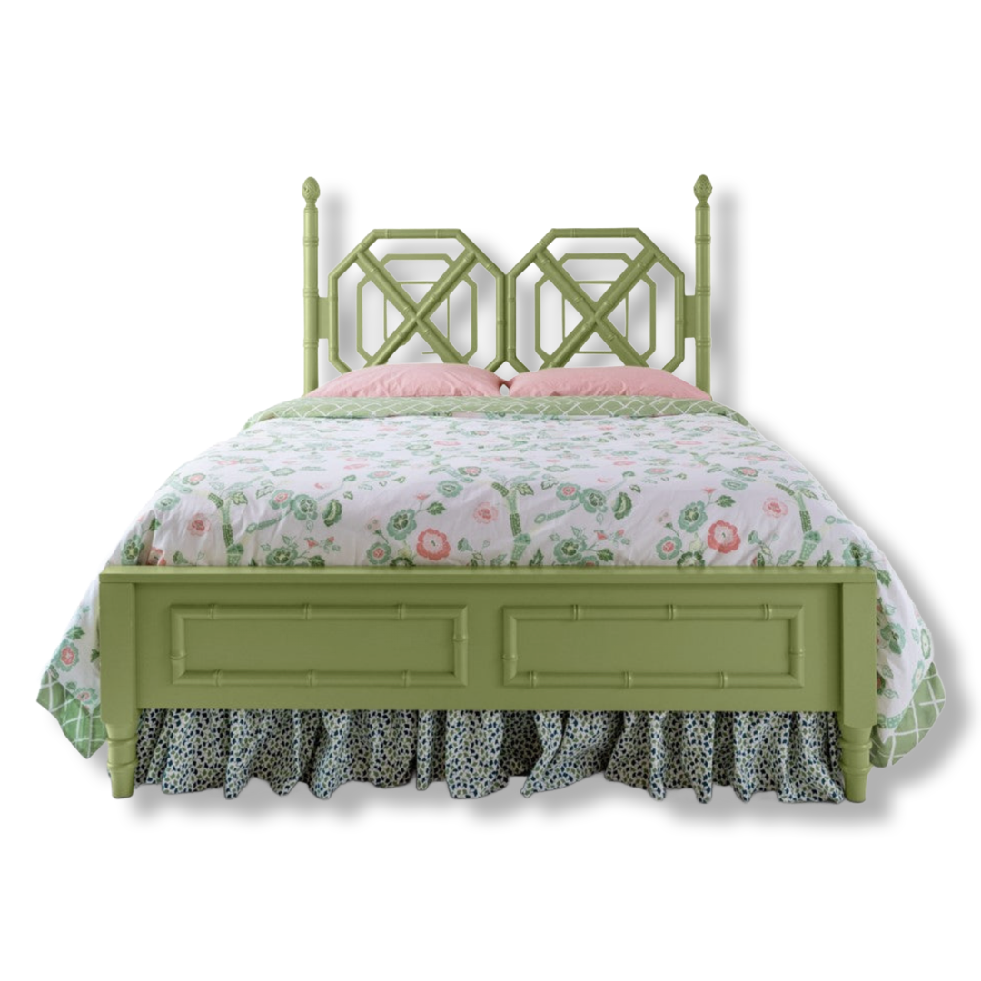 A green faux bamboo bed with chinoiserie bedding from madcap cottage
