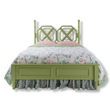 A green faux bamboo bed with chinoiserie bedding from madcap cottage