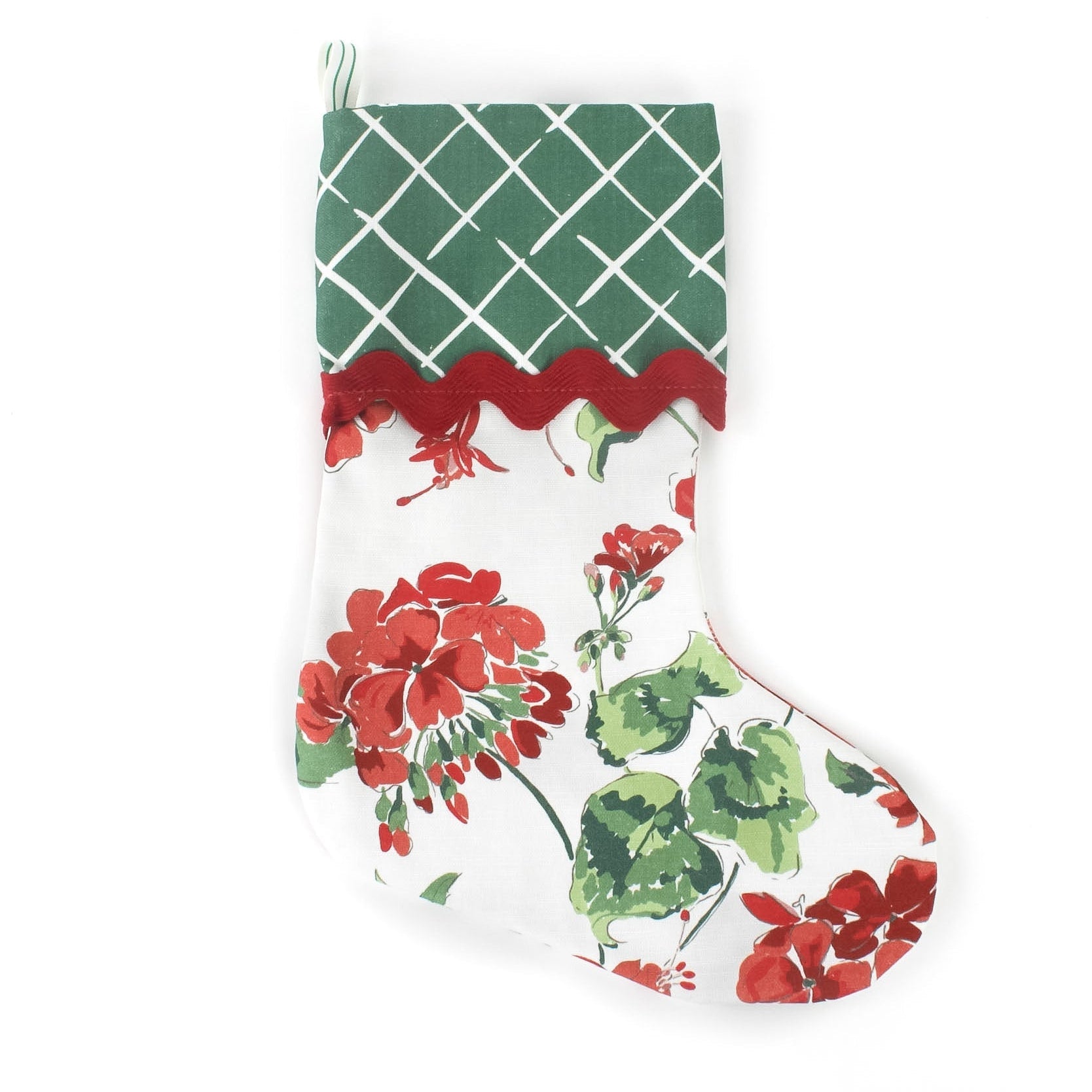 Floral geranium red Christmas stocking with green lattice design cuff on a white background