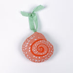 Spiral coral Handcrafted Pink Orange Shells Felt Christmas Ornament with white dotted design and green ribbon.