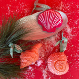 Handcrafted Pink Orange Shells Felt Christmas Ornaments featuring coral spiral, conch, and red scallop shell designs with green gingham ribbons.