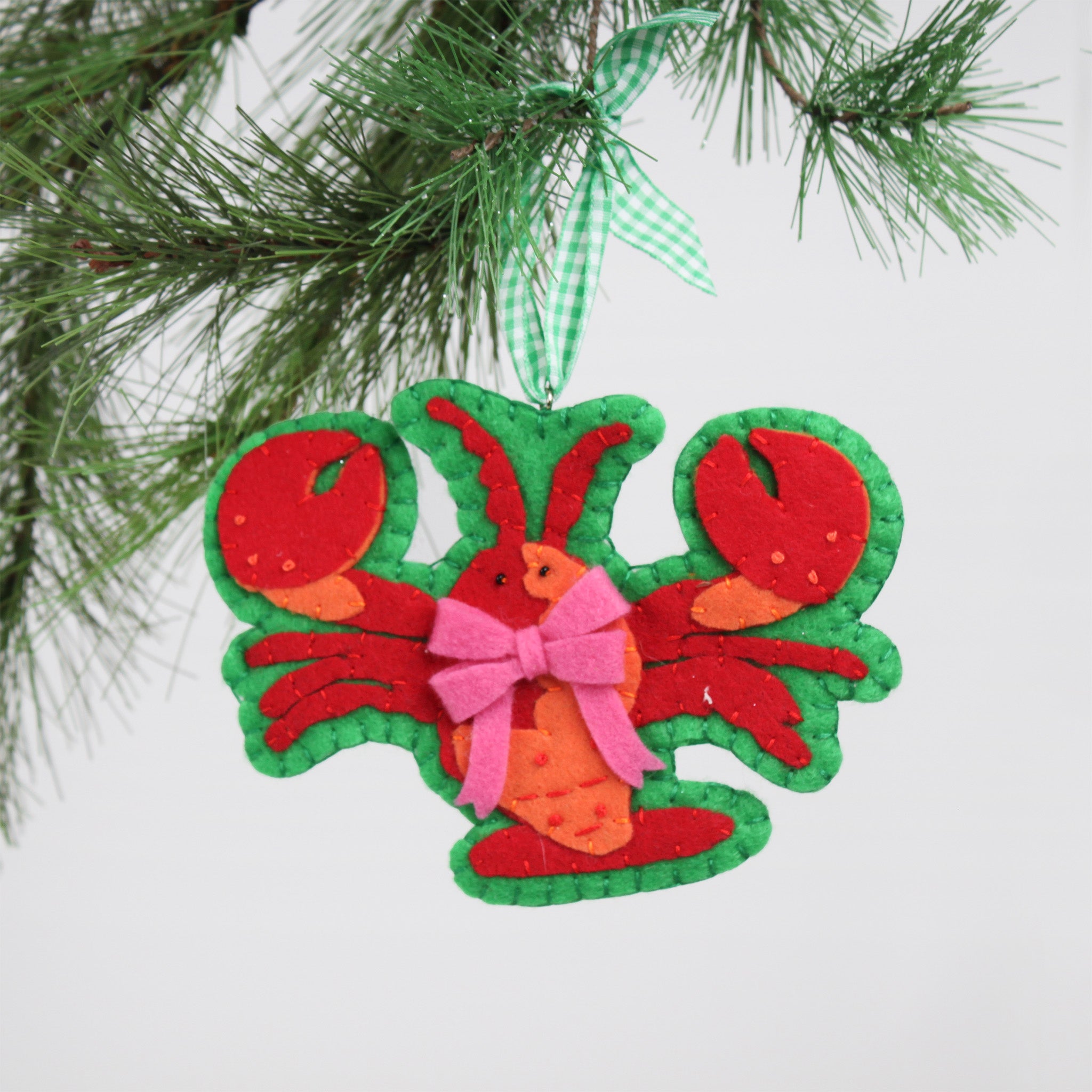Handcrafted Lobster Felt Christmas Ornament on a white background