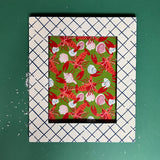 A blue and white photo frame featuring a trellis pattern from madcap cottage