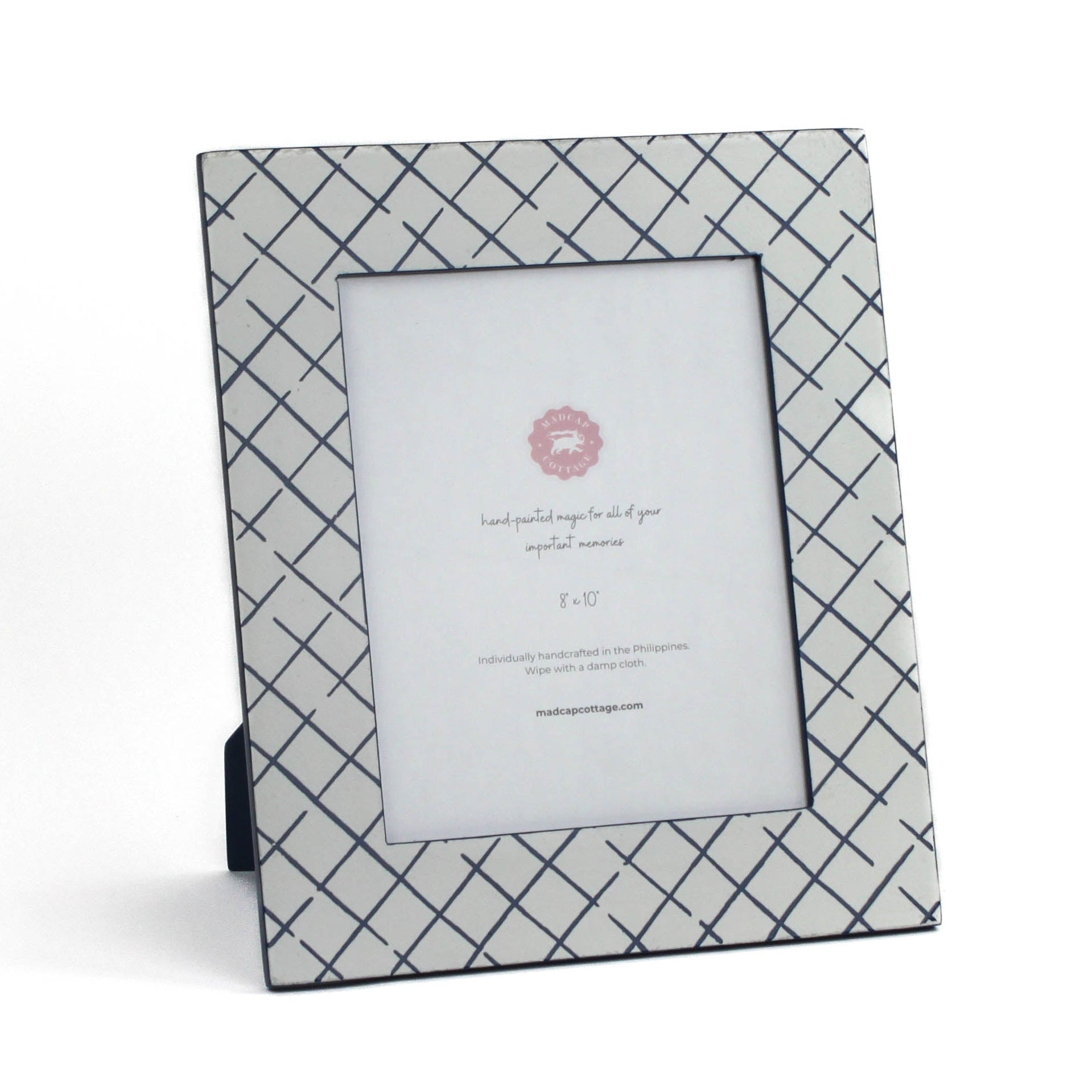 an 8' by 10' Bahama Court hand painted photo frames on a white background