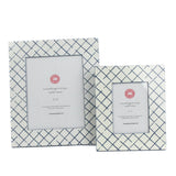 Two Bahama Court white and blue hand painted photo frames on a white background