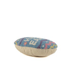 flat hooked pillow with Happy Easter text and colorful egg pattern design
