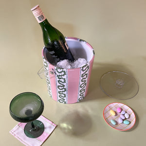 a overhead view of an ice filled Harbor Trail Bahama Pink striped acrylic ice bucket.