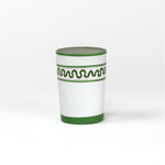 a green painted glass with a squiggly motif at the top called "Harbor Trail" by madcap cottage