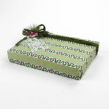 green wrapping paper in fancy stripe patterns