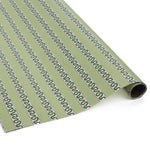 green wrapping paper in fancy stripe patterns