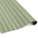 green wrapping paper in fancy stripe patterns