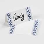 Harbor Trail Paper Place Cards in blue displayed on white background