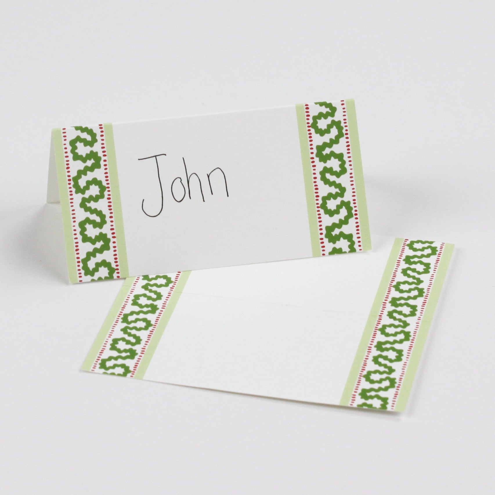Harbor Trail Paper Place Cards in green shown on a white background