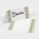 Harbor Trail Paper Place Cards in green and pink displayed on white background