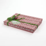 Pink/Red wrapping paper in fancy stripe patterns