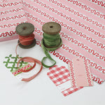Pink/Red wrapping paper in fancy stripe patterns